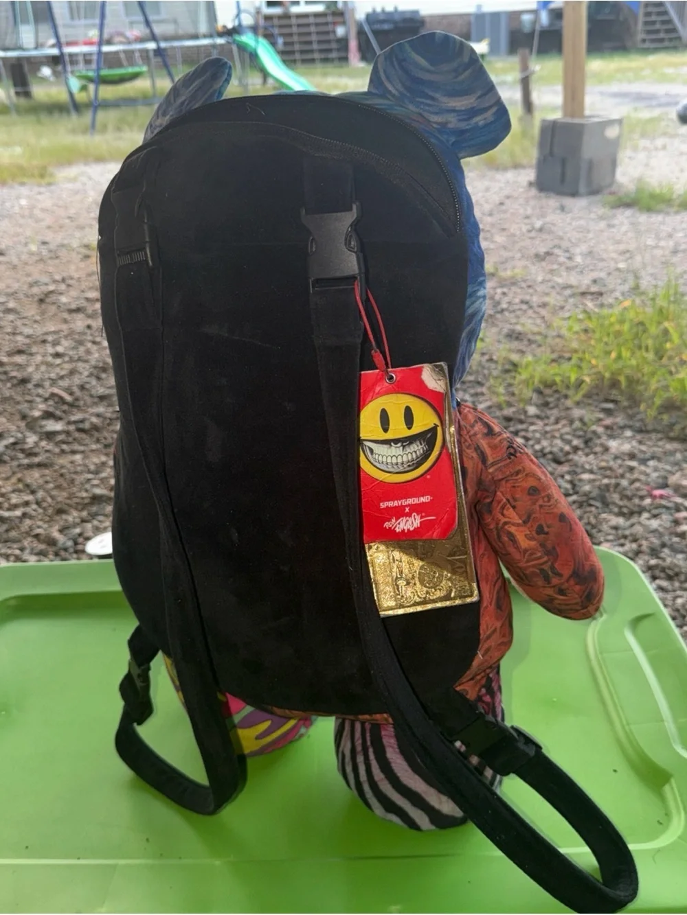 Sprayground Red Tag with Yellow Smiley and Gold Accent